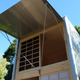 The top door on Muji’s aluminum hut.
